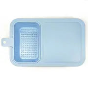 Blue Multifunctional Sink Chopping Board with Drain Basket on a white background