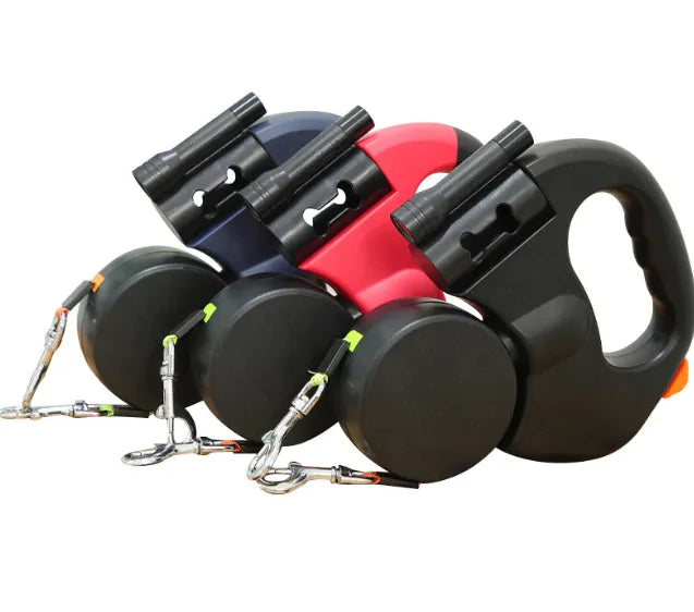 3 Auto Double Dog Leash retractable in black, red, and blue on a white background