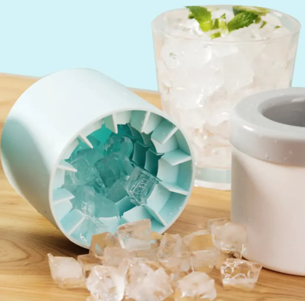 Portable 2-in-1 Ice Bucket and Cube Maker with ice cubes on a wooden surface