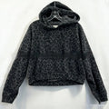 Black leopard print hoodie on a white background