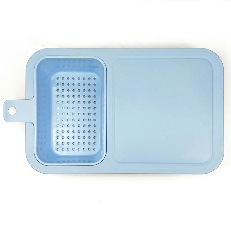 Blue Multifunctional Sink Chopping Board with Drain Basket on a white background