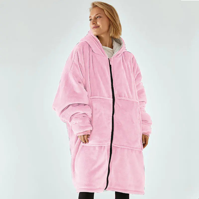Person wearing a pink hooded coat on a white background