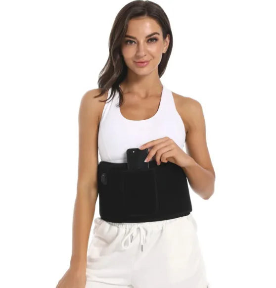Woman wearing a Black LED Infrared Belt Therapy Device with black trim holding a phone on a white background