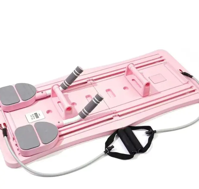 Pink Compact Pilates Sliding Board with resistance bands on a white background