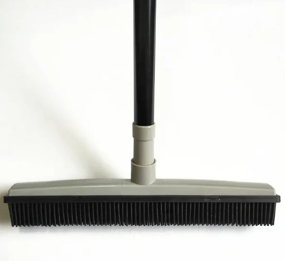 Gray Pet Hair Removal Broom Mop with a black handle on a white background