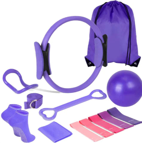 Collection of purple fitness tools including an exercise ball, resistance bands, and a drawstring bag on a white background.
