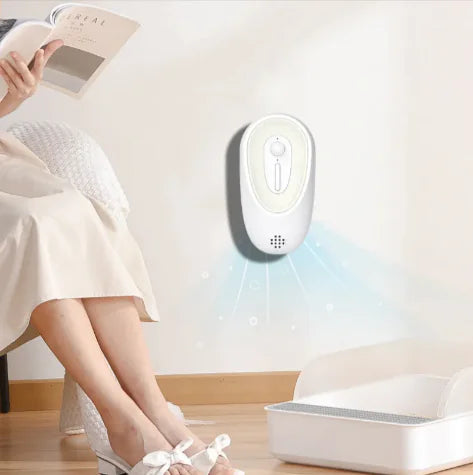 Person sitting on a chair reading a book with a enlarged Pet Odor Eliminator and  Deodorizer on the wall.